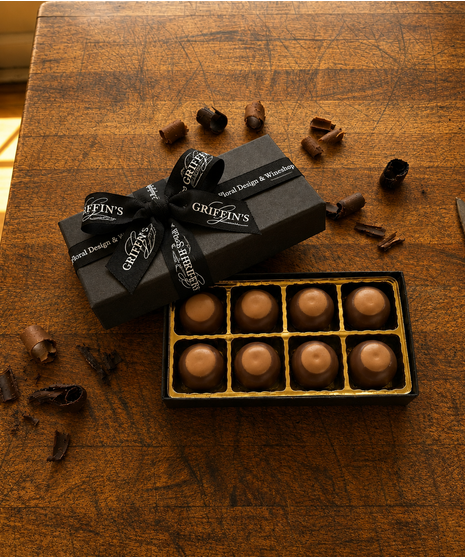 Handcrafted Columbus Ohio Amish peanut butter buckeyes coated in rich milk chocolate and packaged in Griffin's signature gift box.