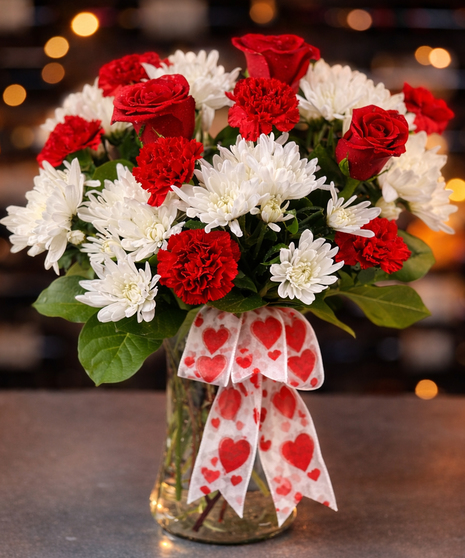 Classic Valentine’s Day vase with red carnations and white mums delivered in Columbus, Ohio.