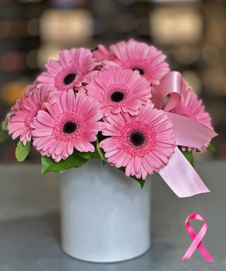 Gerbera’s of Strength pink gerbera daisy arrangement with pink ribbon in a white vase for Breast Cancer Awareness Month – Griffin’s Floral Design Columbus Ohio
