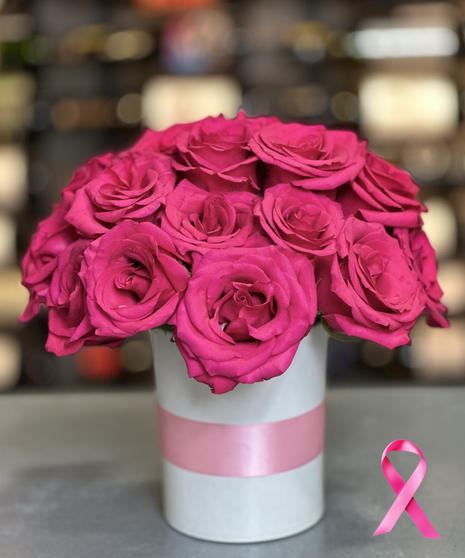 Grace in Pink hot pink rose arrangement in a white vase with pink ribbon for Breast Cancer Awareness Month – Griffin’s Floral Design Columbus Ohio
