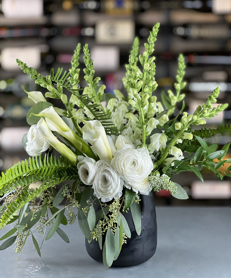 Elegant white calla lily and ranunculus arrangement delivered in Columbus, Ohio by florist Griffins Floral